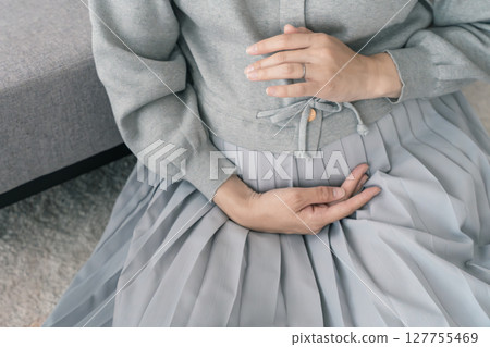 A pregnant woman looking forward to becoming a mother A pregnant woman looking forward to becoming a mother 127755469
