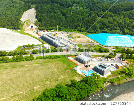 Aerial view of the construction site around JR Hokkaido Shinkansen Yakumo Station in Yakumo Town, Hokkaido in early summer Aerial view of the construction site around JR Hokkaido Shinkansen Yakumo Station in Yakumo Town, Hokkaido in early summer 127755544