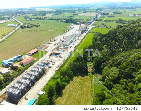 Aerial view of the construction site around JR Hokkaido Shinkansen Yakumo Station in Yakumo Town, Hokkaido in early summer Aerial view of the construction site around JR Hokkaido Shinkansen Yakumo Station in Yakumo Town, Hokkaido in early summer 127755548