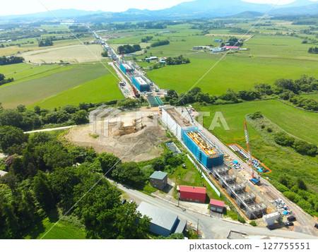 Aerial view of the construction site around JR Hokkaido Shinkansen Yakumo Station in Yakumo Town, Hokkaido in early summer Aerial view of the construction site around JR Hokkaido Shinkansen Yakumo Station in Yakumo Town, Hokkaido in early summer 127755551