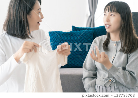 Mother and daughter talk about a bright future while preparing for birth Mother and daughter talk about a bright future while preparing for birth 127755708