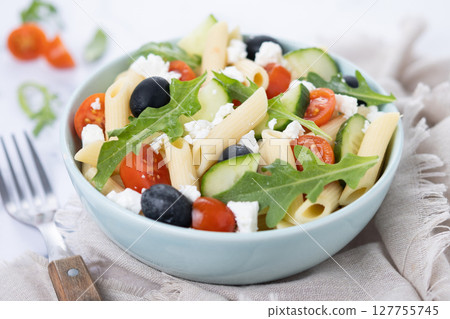 Mediterranean Pasta Salad in bowl 127755745