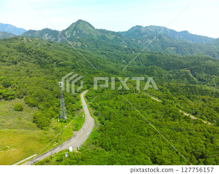 Aerial view of the top of Unseki Pass in Yakumo Town, Hokkaido in early summer Aerial view of the top of Unseki Pass in Yakumo Town, Hokkaido in early summer 127756157