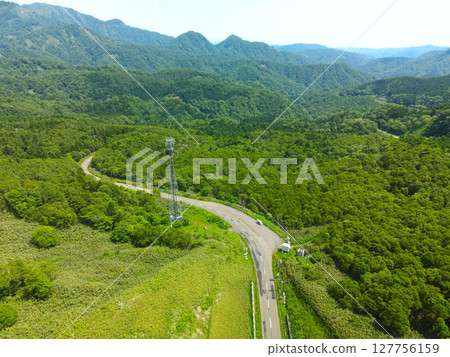 Aerial view of the top of Unseki Pass in Yakumo Town, Hokkaido in early summer Aerial view of the top of Unseki Pass in Yakumo Town, Hokkaido in early summer 127756159