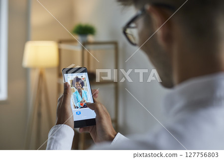 Male friend, follower or fan on social network or dating app liking picture of beautiful woman. 127756803