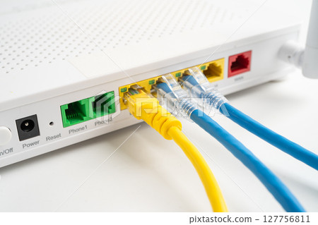 Ethernet cable with wireless router connect to internet service provider internet network. 127756811