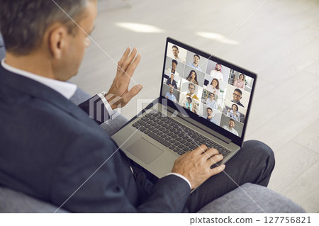 Businessman talk on webcam video call on computer Businessman talk on webcam video call on computer 127756821