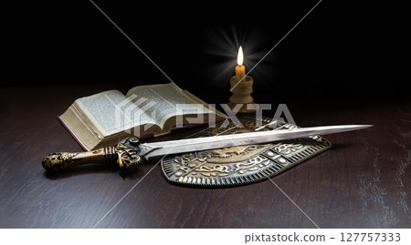 Book with sword and shield Book with sword and shield 127757333