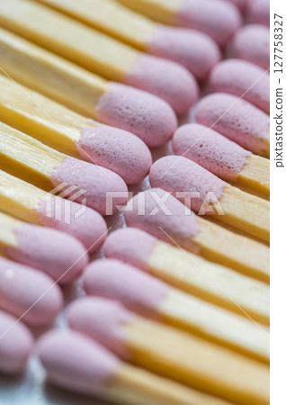 Pink matches sticks on bright background, macro photo Pink matches sticks on bright background, macro photo 127758327