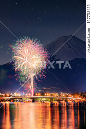 Fireworks reflected on the lakeside and the silhouette of Mt. Fuji Fireworks reflected on the lakeside and the silhouette of Mt. Fuji 127758433