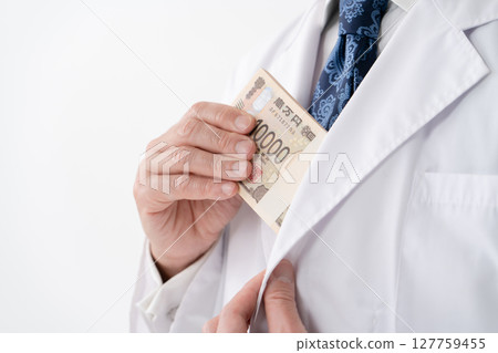 Man in white coat money 127759455