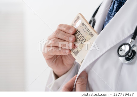 Man in white coat money Man in white coat money 127759457