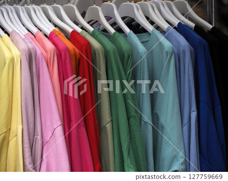 colorful clothes shirt hanging in street market store 127759669