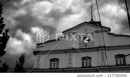 Dramatic Sky Over Historic Clock Building in Ukraine, Black and White Dramatic Sky Over Historic Clock Building in Ukraine, Black and White 127760098