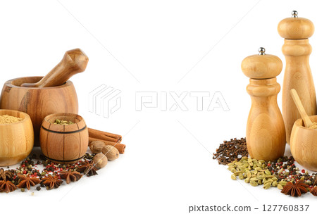 Pepper grinder mill, mortar, pestle and spice set isolated on white background. Free space for text. Pepper grinder mill, mortar, pestle and spice set isolated on white background. Free space for text. 127760837