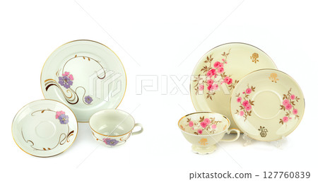 Porcelain vintage cup and saucer isolated on white background. Porcelain vintage cup and saucer isolated on white background. 127760839