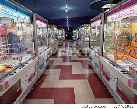Crane games lined up at an arcade Crane games lined up at an arcade 127761932