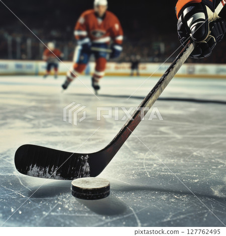 hockey player skating the puck 127762495