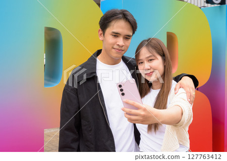 LGTBQ Pride supporting couple selfie portrait LGTBQ Pride supporting couple selfie portrait 127763412
