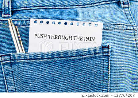 Despite discomfort concept. Words PUSH THROUGH THE PAIN 127764207