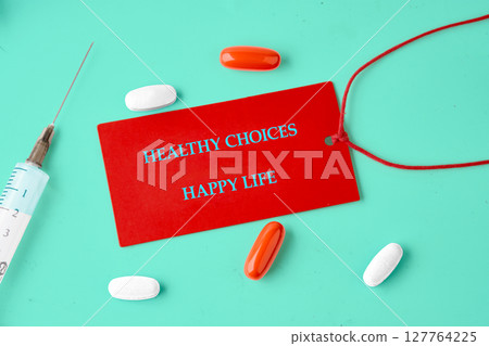 The concept phrase HEALTHY CHOICES HAPPY LIFE. Conversation, domestic, lifestyle, happiness, interaction concept 127764225