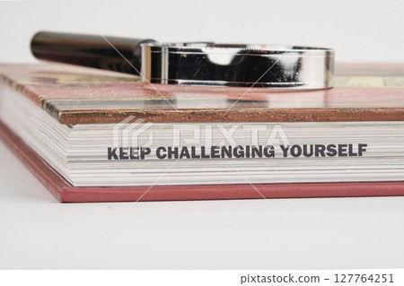 Personal growth concept. Words KEEP CHALLENGING YOURSELF Personal growth concept. Words KEEP CHALLENGING YOURSELF 127764251