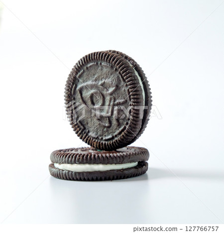 Chocolate cookie with cream on background. 127766757