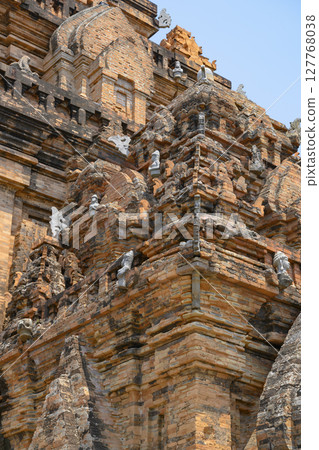 Roof of ancient North Po Nagar Cham Tower with sculptures of the 12th century in Nha Trang, Vietnam Roof of ancient North Po Nagar Cham Tower with sculptures of the 12th century in Nha Trang, Vietnam 127768038
