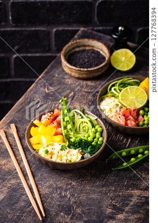 Healthy bowl with salmon and vegetables Healthy bowl with salmon and vegetables 127768394