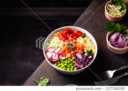 Balanced healthy bowl with vegetables and salmon Balanced healthy bowl with vegetables and salmon 127768395