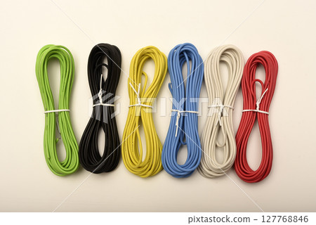 Coils of multicolored wires. Connecting wires for electronics. Coils of multicolored wires. Connecting wires for electronics. 127768846