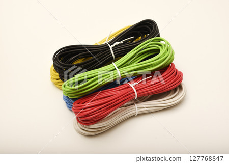 Coils of multicolored wires. Connecting wires for electronics. Coils of multicolored wires. Connecting wires for electronics. 127768847