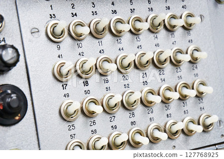Mechanical switches on old electrical device Mechanical switches on old electrical device 127768925