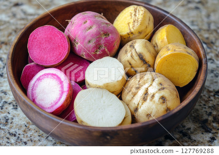 Colorful Root Vegetable Prep in Bowl. 127769288