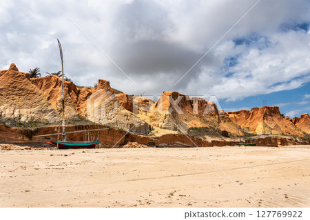 The rock formations at Canoa Quebrada Beach at Canoa Quebrada, state of Ceara, Brazil 127769922
