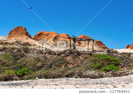 The rock formations at Canoa Quebrada Beach at Canoa Quebrada, state of Ceara, Brazil The rock formations at Canoa Quebrada Beach at Canoa Quebrada, state of Ceara, Brazil 127769931