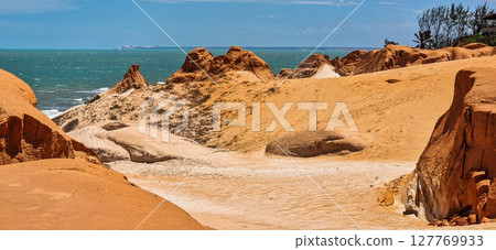 The rock formations at Canoa Quebrada Beach at Canoa Quebrada, state of Ceara, Brazil 127769933