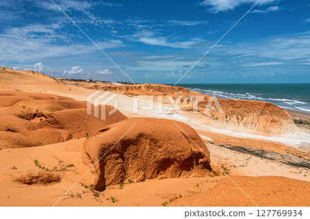 The rock formations at Canoa Quebrada Beach at Canoa Quebrada, state of Ceara, Brazil 127769934