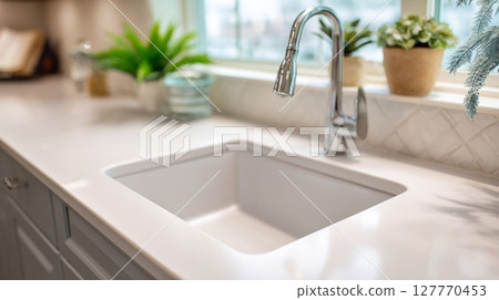 Modern faucet with streaming water in sunlit kitchen. Neural network AI generated 127770453