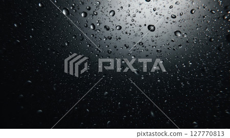 Raindrops on darkened surface neural network AI generated 127770813