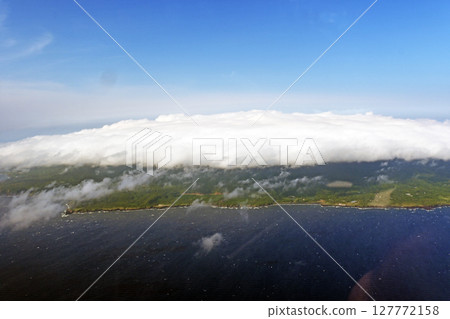 Clouds cover Izu Oshima and Mount Mihara. 127772158