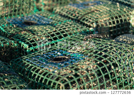Crab Traps Arranged on a Dock Ready for Use in 127772636