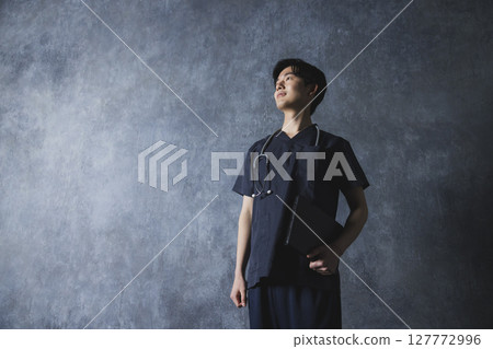 Male doctor and nurse in scrubs 127772996