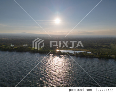 Beautiful lake shore landscape Beautiful lake shore landscape 127774372