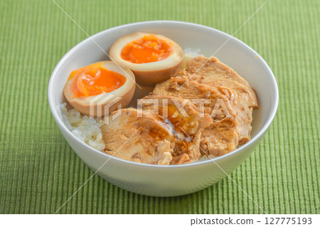 Chicken char siu and boiled egg rice bowl 127775193