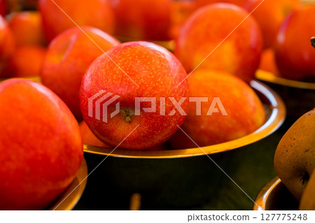 Fresh red and yellow apples, outdoor fruit farm market Fresh red and yellow apples, outdoor fruit farm market 127775248
