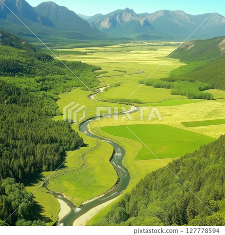 Vast green valley with winding river and wildflowers creates a peaceful natural retreat 127778594