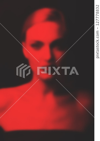 Abstract blurred and noisy woman portrait silhouette 127778832