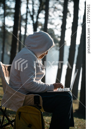 Future remote work combines technology nature smart phone enable e-learning productivity while traveling blending comfort modern devices serenity computer equipment business connection natural world 127779081