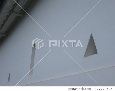 Hole in the castle wall Hole in the castle wall 127779396